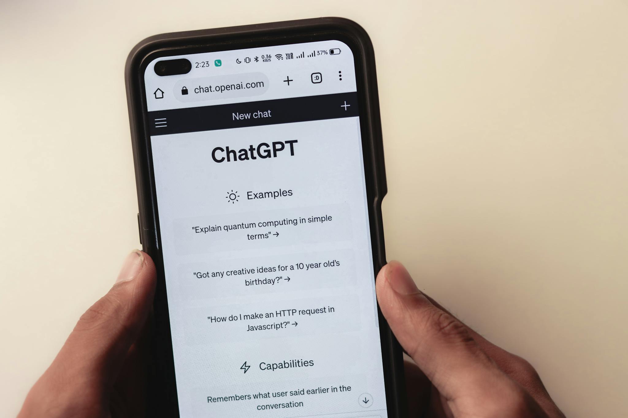 About Close Up Of Hands Holding A Smartphone Displaying